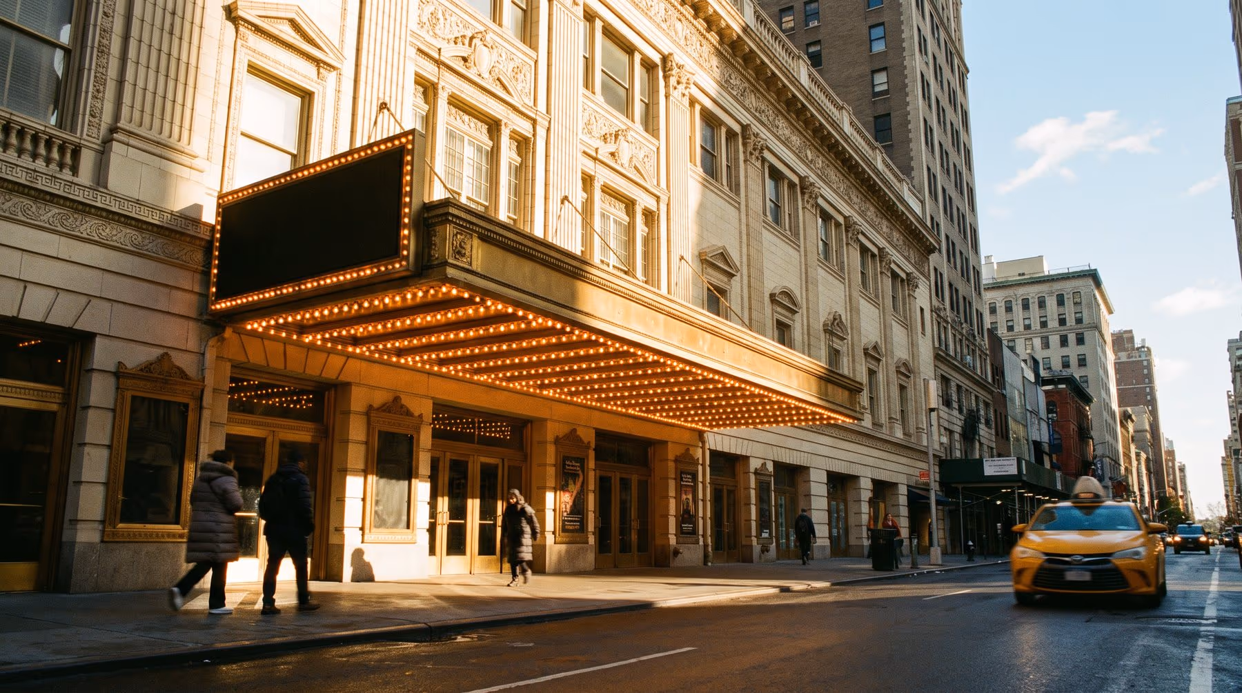 A Broadway theatre marquee representing an included ticket