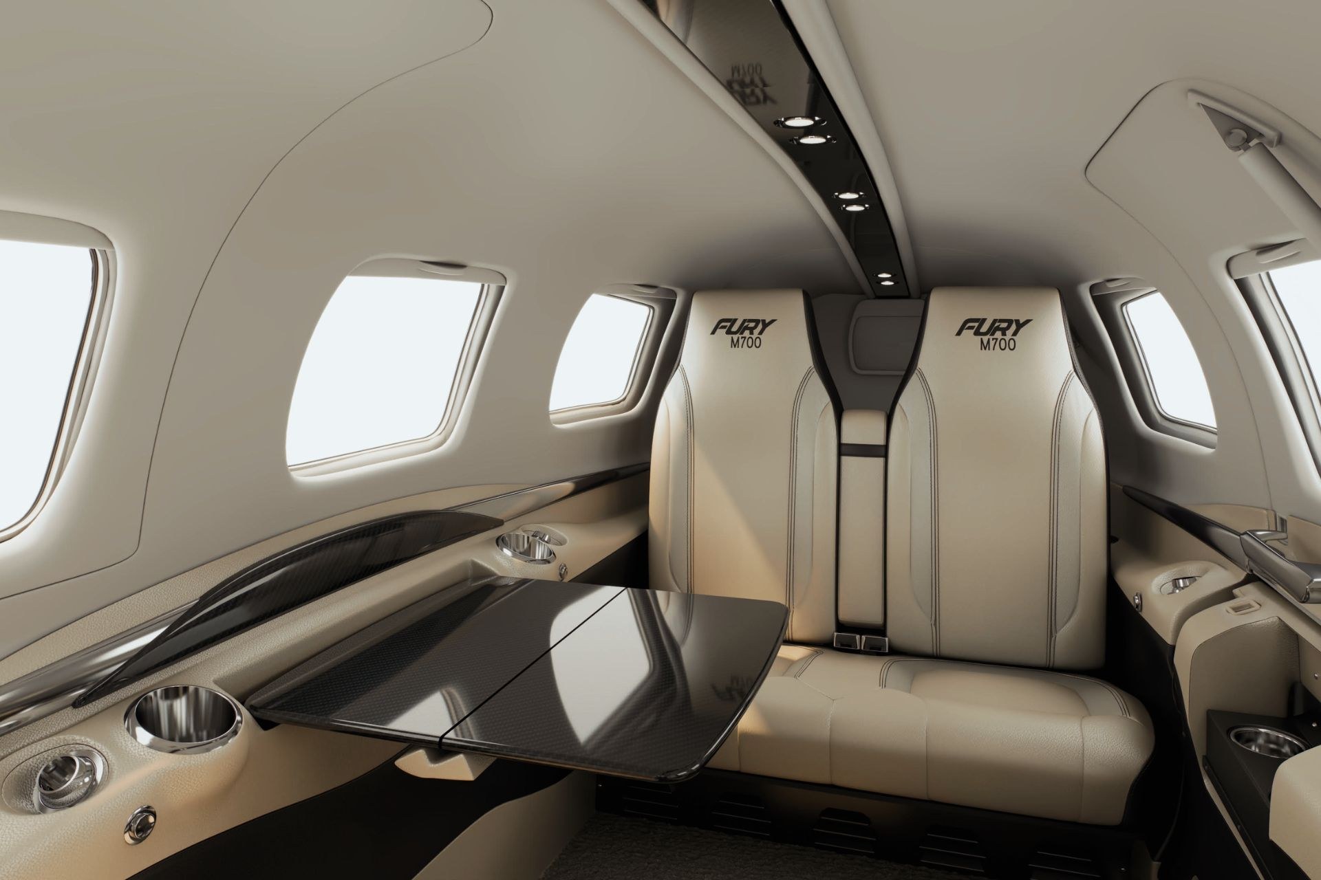 Official Piper M700 cabin with cream leather seats and a conference table